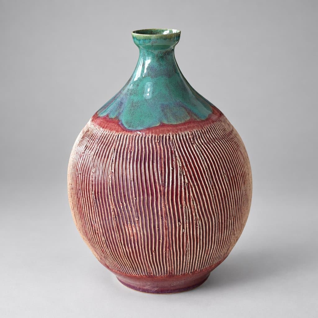Textured, cream stoneware vase in seaweed and wine