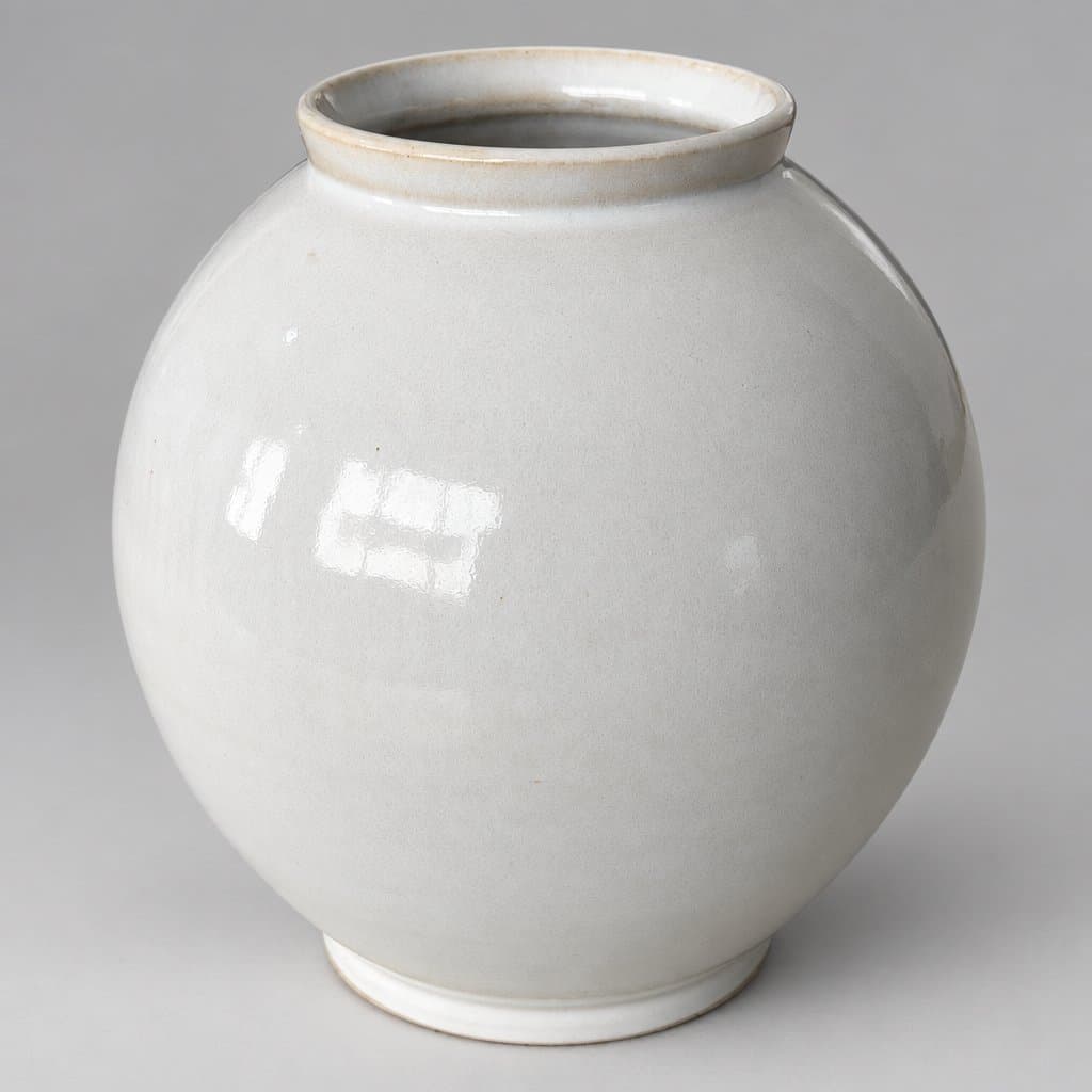 Medium, cream stoneware vase in glossy white